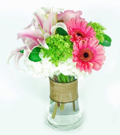 Pink Oriental Lillies, Green Hydrangeas, Pink Gerbera and Roses Highlight this exquisite bouquet.