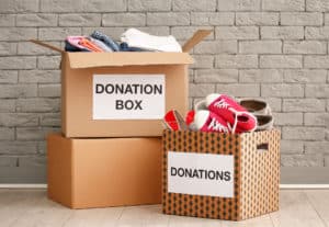 Donation boxes with shoes and clothes