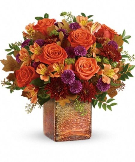 Hand-arranged in a shimmering opalescent mercury glass cube with gorgeous golden ombre finish, this vibrant autumnal arrangement is a beautifully breathtaking surprise!